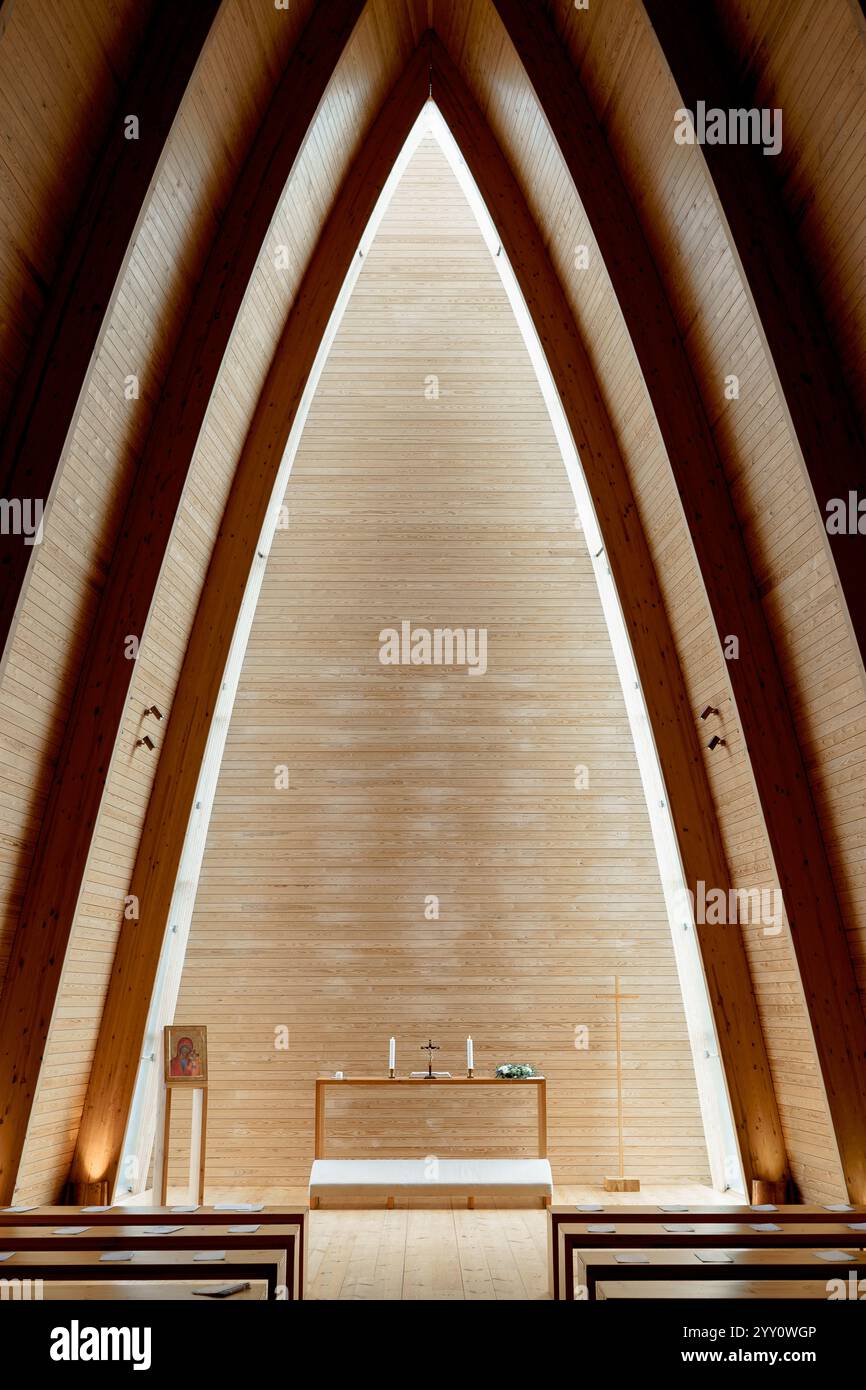 interior of a church in the light of the sun with wooden walls in Turku ...