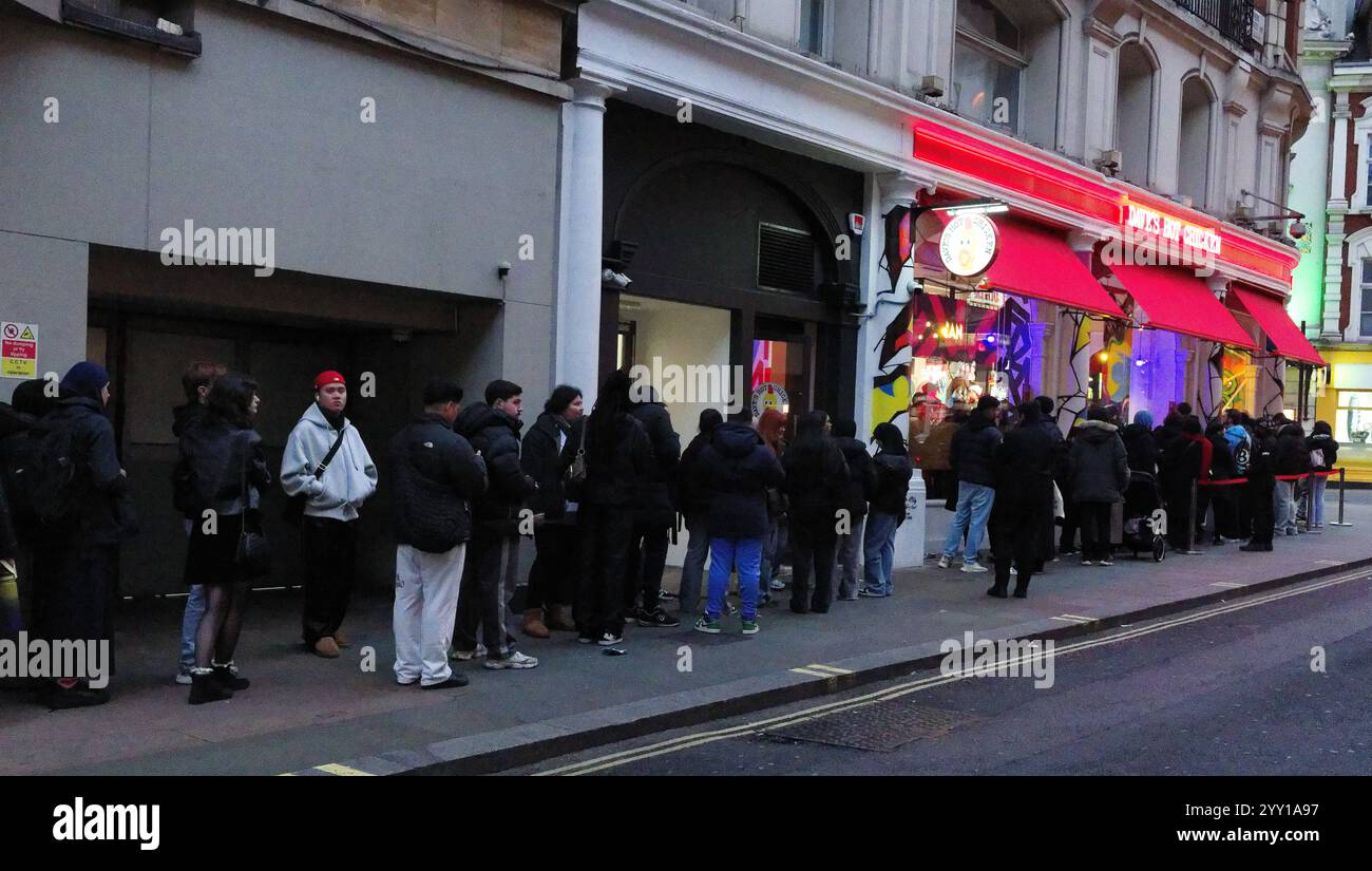 Queue Sign Restaurant Long queue for Dave's Hot Chicken restaurant on Shaftsbury Avenue in ...