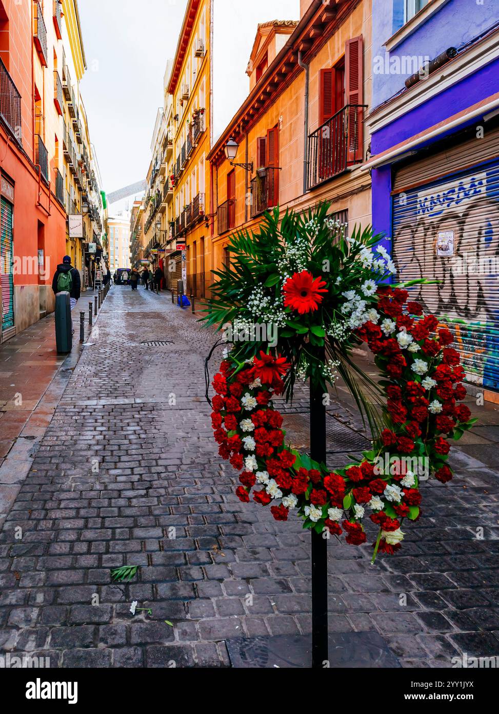 Madrid, Spain, december 14,2024. Funeral wreaths for the disappearance of traditional life in the Lavapies neighborhood. Neighbors' fight against gent Stock Photo