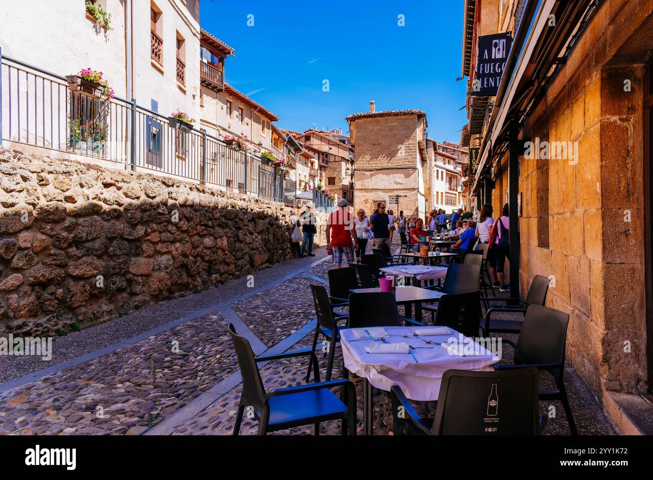 Lively streets of Frías town on a sunny day. Frías, Las Merindades, Burgos, Castilla y León, Spain, Europe Stock Photo