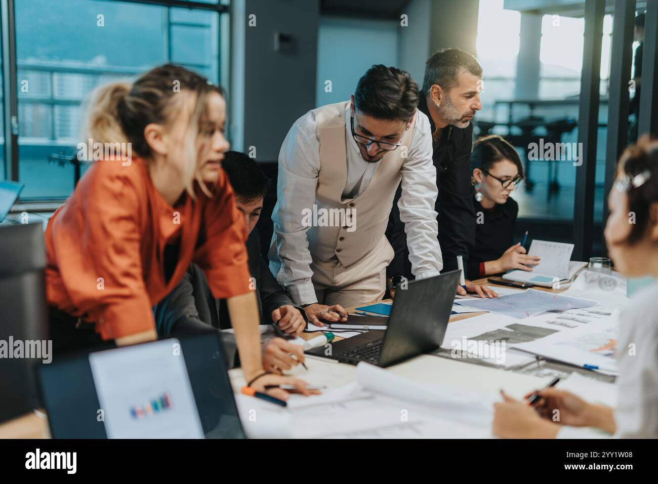 Diverse business team collaborating on a creative project together Stock Photo