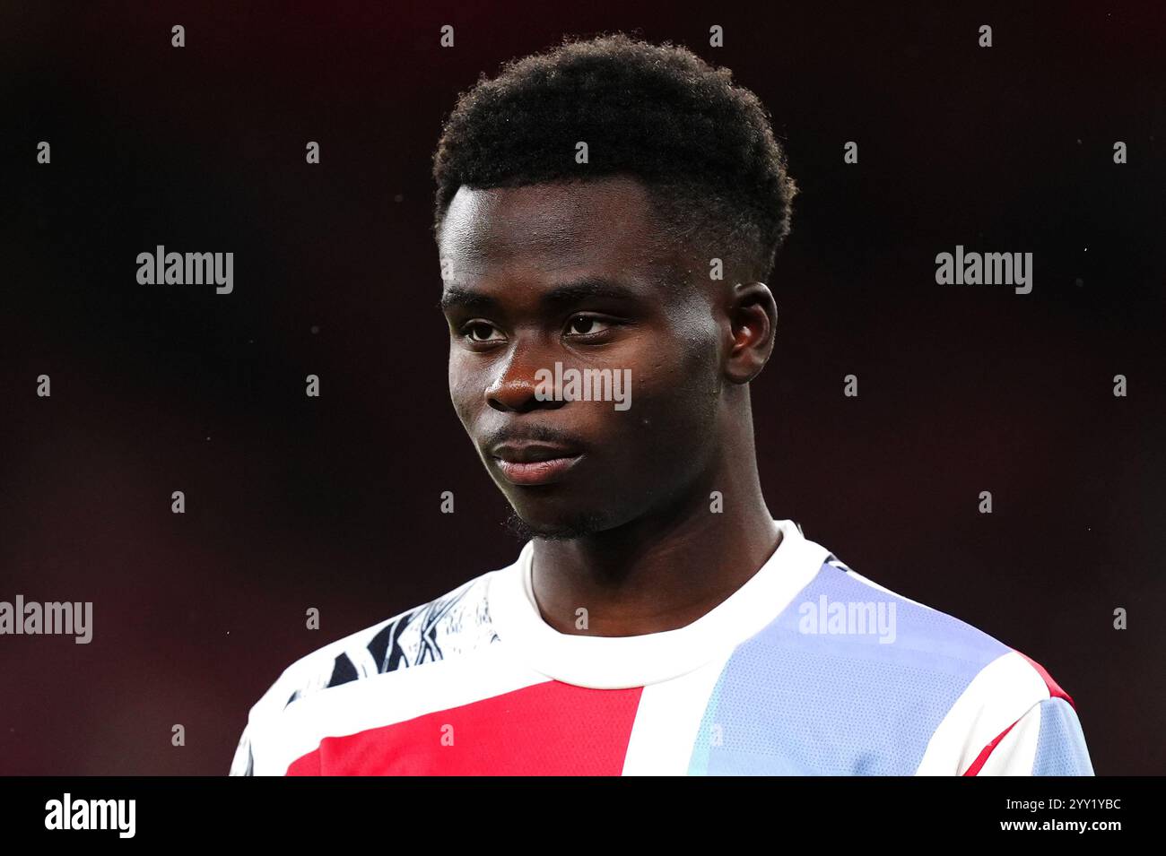 Arsenal's Bukayo Saka warming up before the Carabao Cup quarterfinal