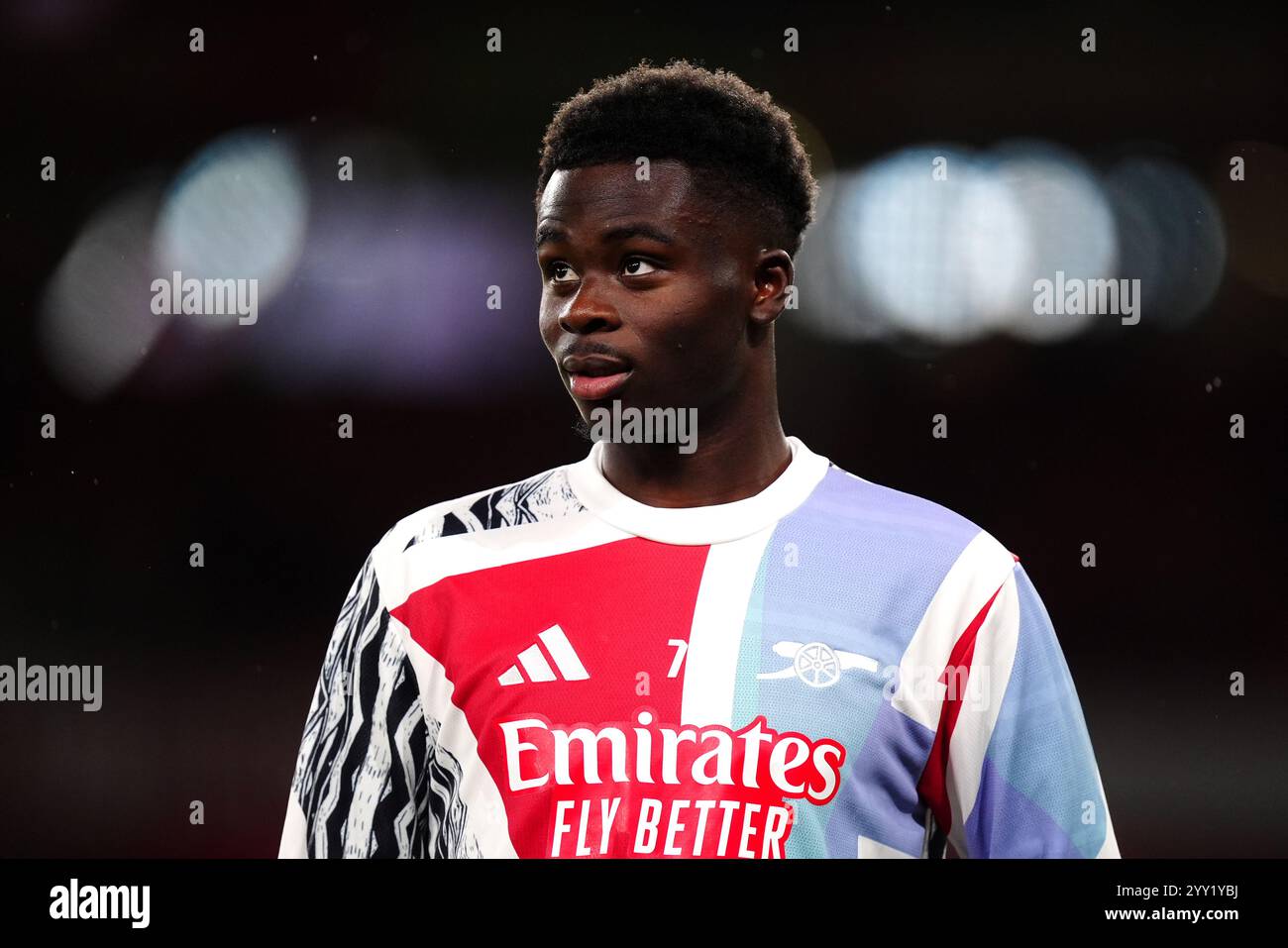 Arsenal's Bukayo Saka warming up before the Carabao Cup quarterfinal
