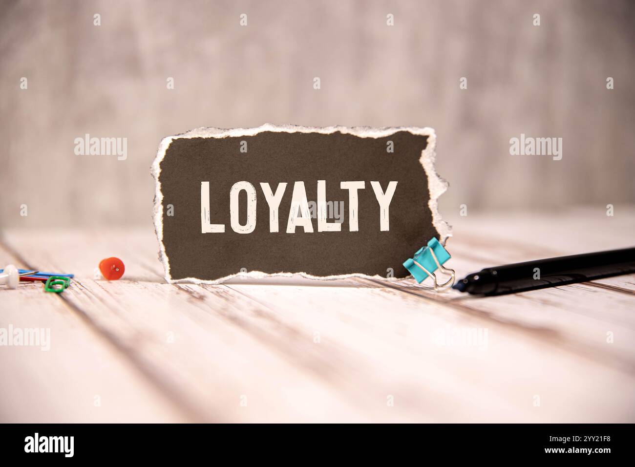 Loyalty Program text on a notepad on chart with keyboard and calculator. Stock Photo