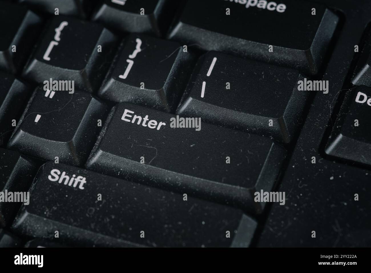 A black dusty computer keyboard. Close up. Stock Photo