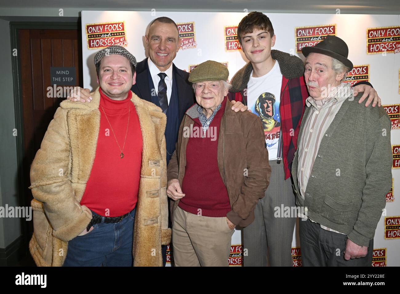 Actor Sir David Jason (centre) joins cast members (left to right) Sam Lupton, Vinnie Jones, Tom Major, and Paul Whitehouse of Only Fools and Horses The Musical ahead of the opening night at the Hammersmith Apollo, in west London, which sees the West End debut of actor Vinnie Jones playing gangster Danny Driscoll. Picture date: Wednesday December 18, 2024. Stock Photo