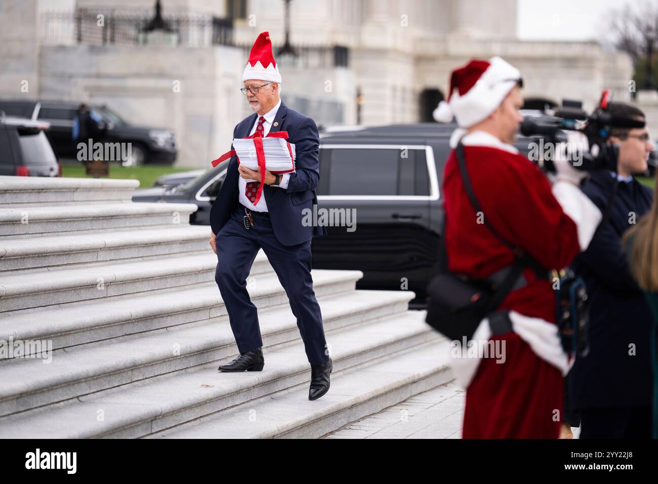 UNITED STATES DECEMBER 18 Rep. Randy Weber, RTexas, holds a copy of