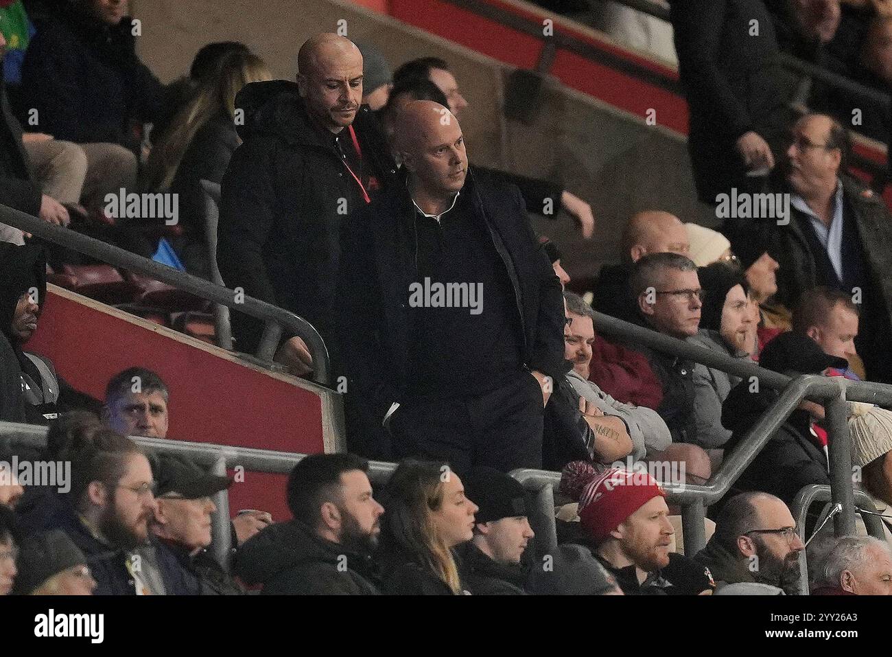 Liverpool manager Arne Slot watches on from the stands during the