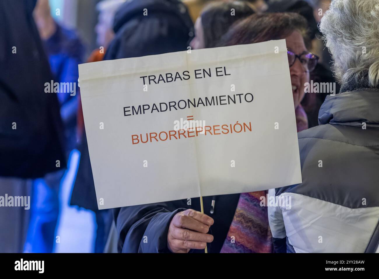 Logroño, La Rioja, Spain. December 18, 2024. The image represents the International Migrants Day, a day of reflection and vindication on the rights of people who move in search of better living conditions. The aim is to make visible the challenges, but also the fundamental contributions of migrants to host societies. The photography captures diversity, showing faces, stories and experiences that represent the complexity of contemporary migration. The processes of integration, efforts to maintain cultural identity and the struggle against discrimination are evident. The image seeks to generate Stock Photo