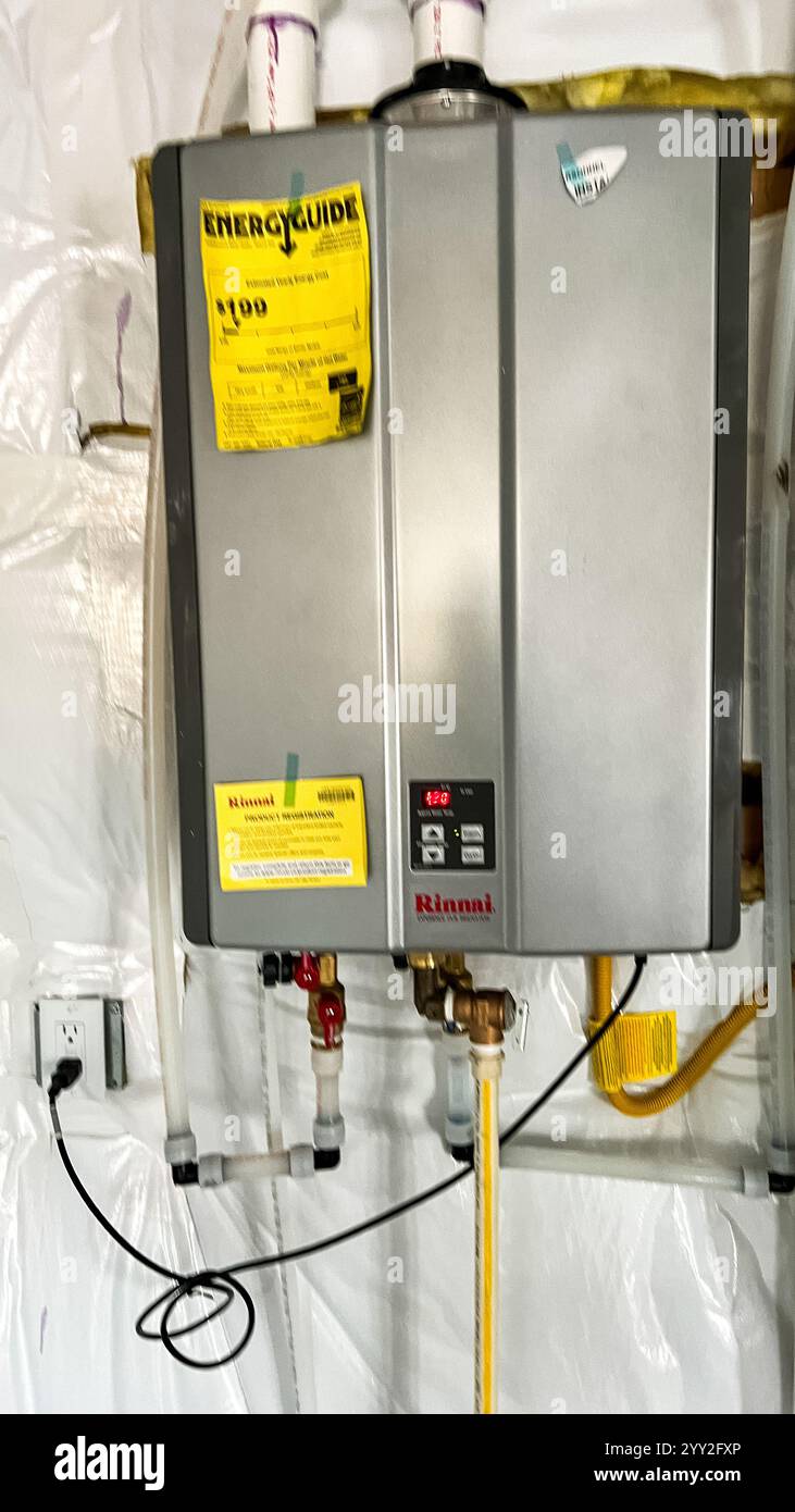 Tankless Water Heater Installed in New Construction Home Stock Photo ... - Plumbed Tankless Water Heater Systems For Apartments