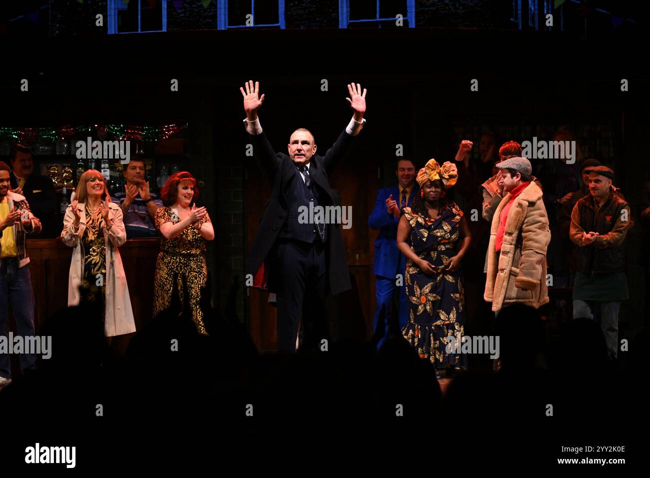 Ex-footballer Vinnie Jones raises his hands during the curtain call after making his stage acting debut as one half of the notorious Driscoll brothers, crime boss Danny Driscoll in Only Fools and Horses The Musical at the Hammersmith Apollo, in west London. Picture date: Wednesday December 18, 2024. Stock Photo