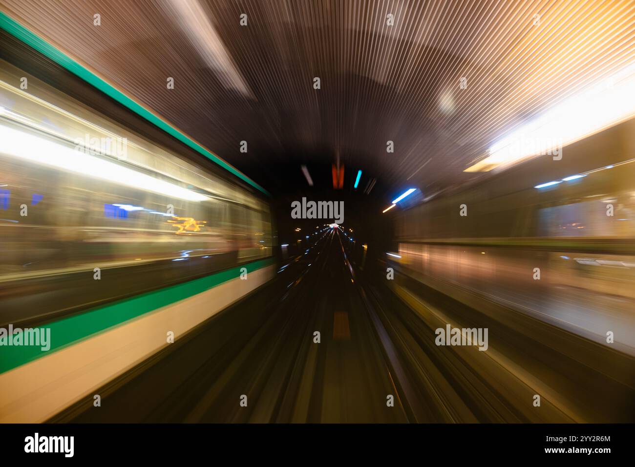 Motion blur of a subway tunnel. Motion-blurred photo from a subway car ...