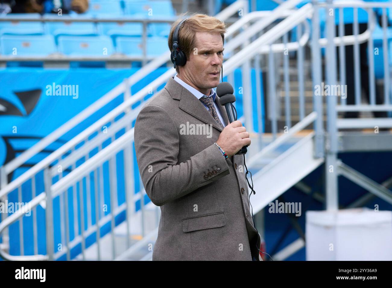 FOX NFL color commentator Greg Olsen works on the sideline prior to an ...