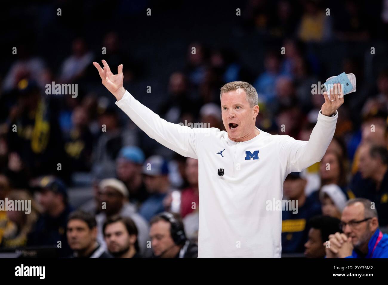 December 18, 2024 Michigan Wolverines head coach Dusty May reacts to a