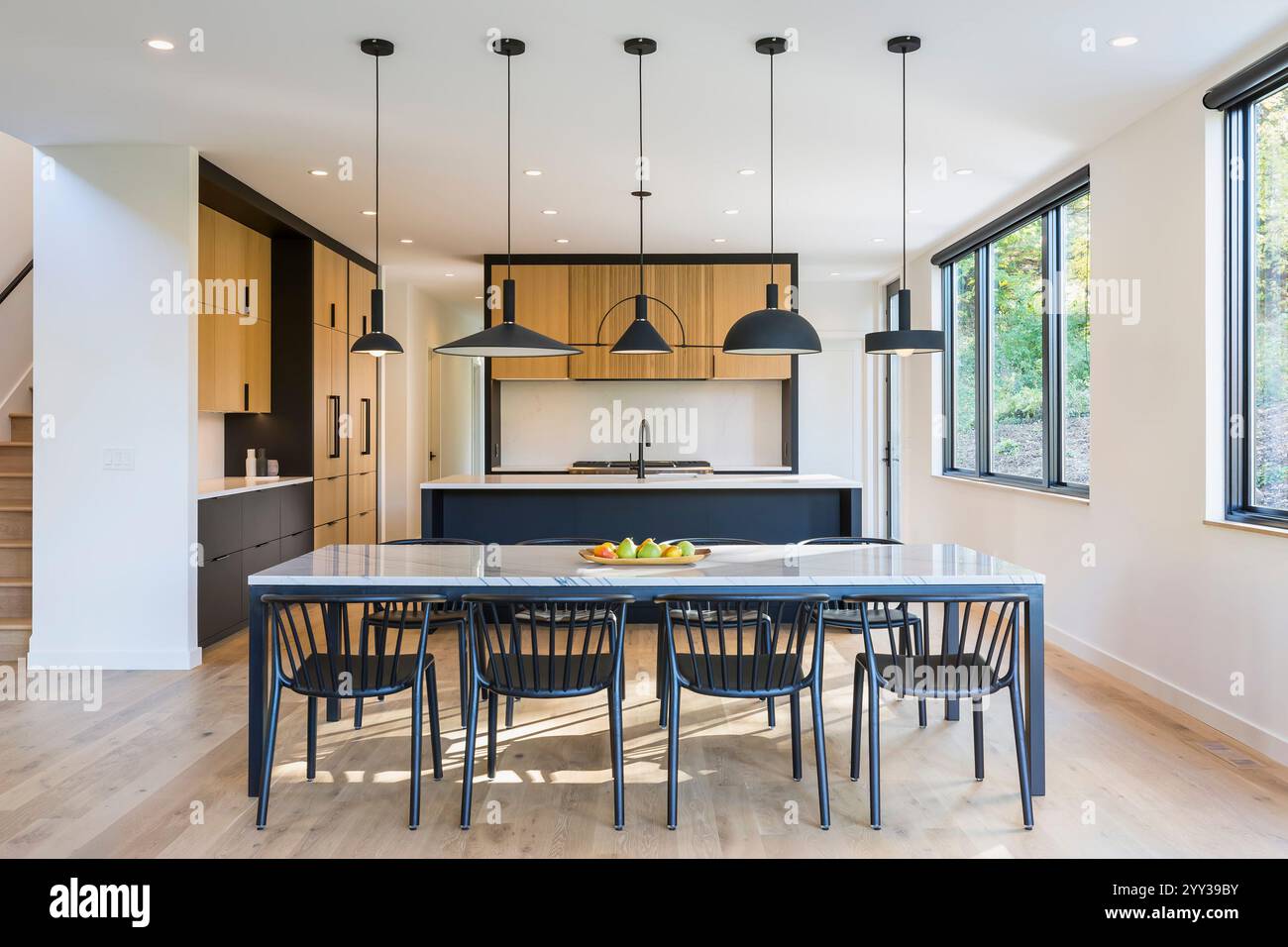 Modern kitchen with two tone white oak and black cabinets Stock Photo ...