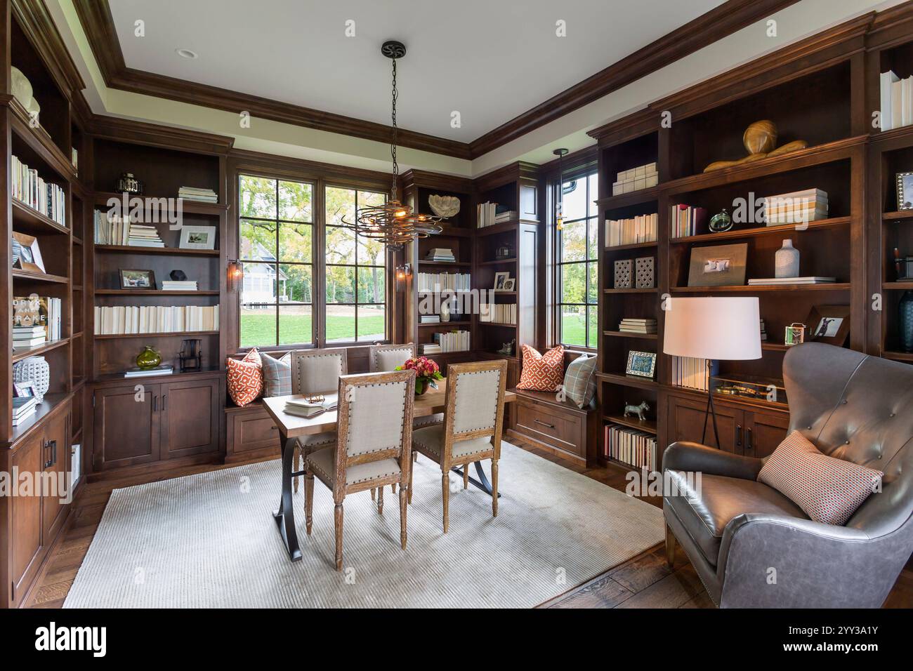 Beautiful home office floor to ceiling wood bookshelves Stock Photo - Alamy
