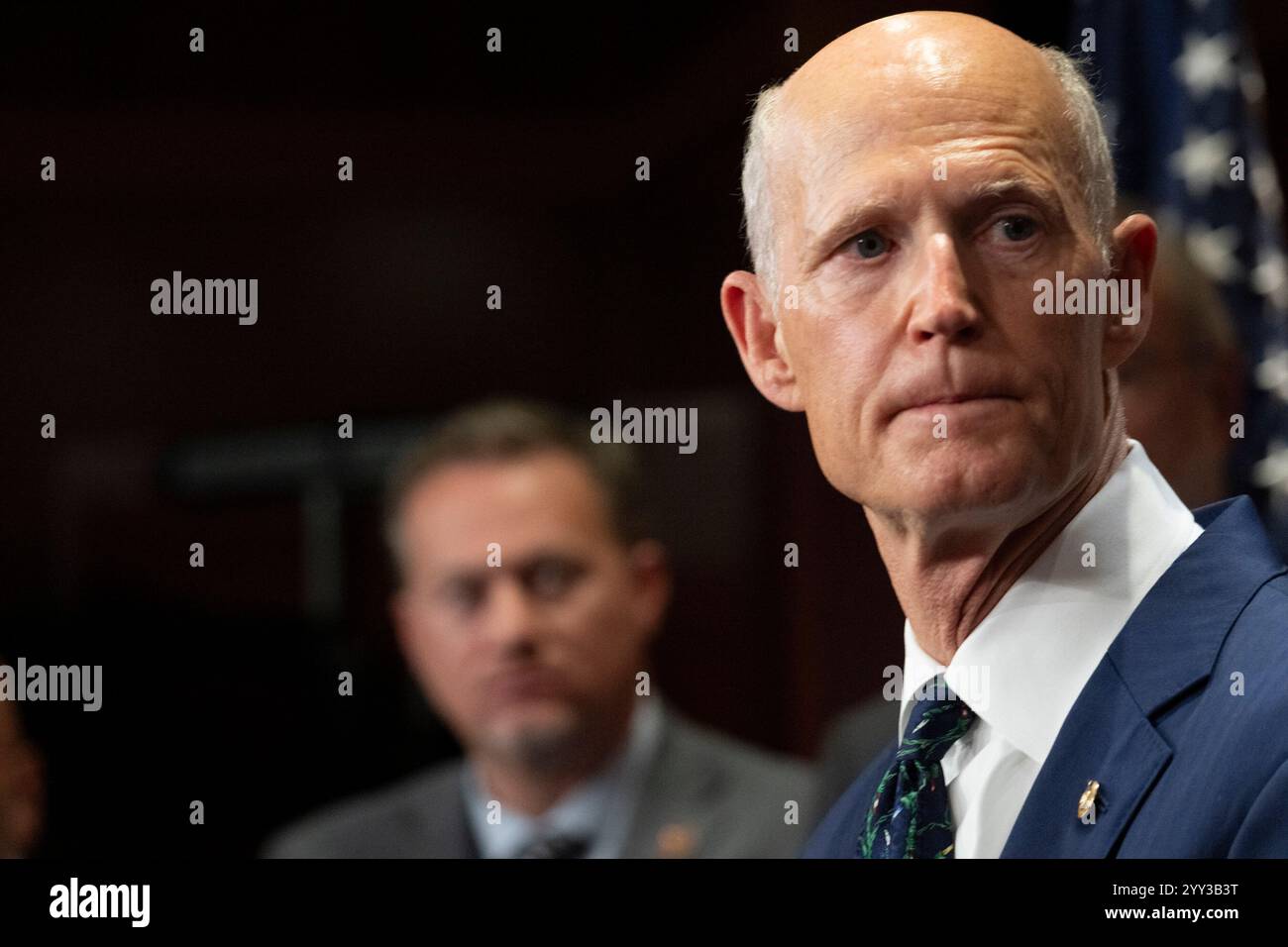 United States Senator Rick Scott (Republican of Florida) listens to ...