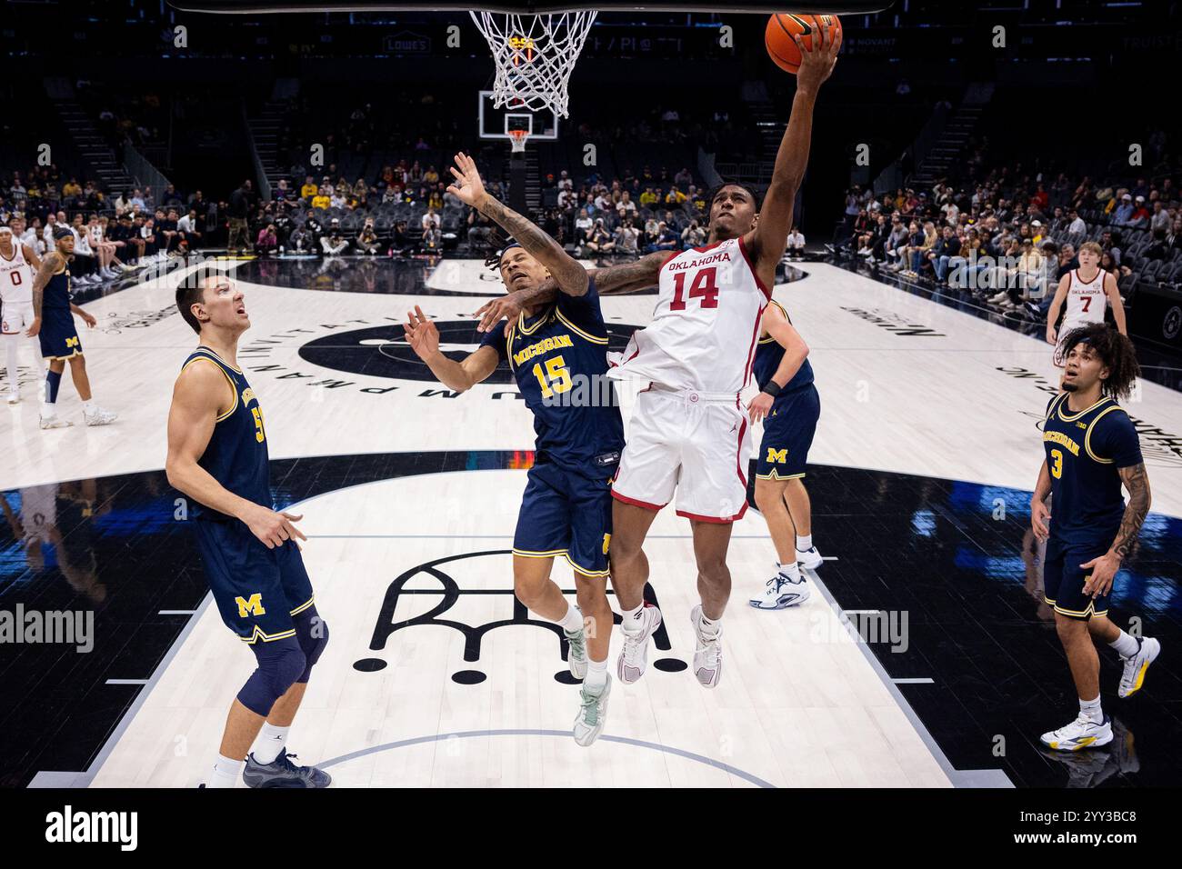 December 18, 2024 Oklahoma Sooners forward Jalon Moore (14) shoots on