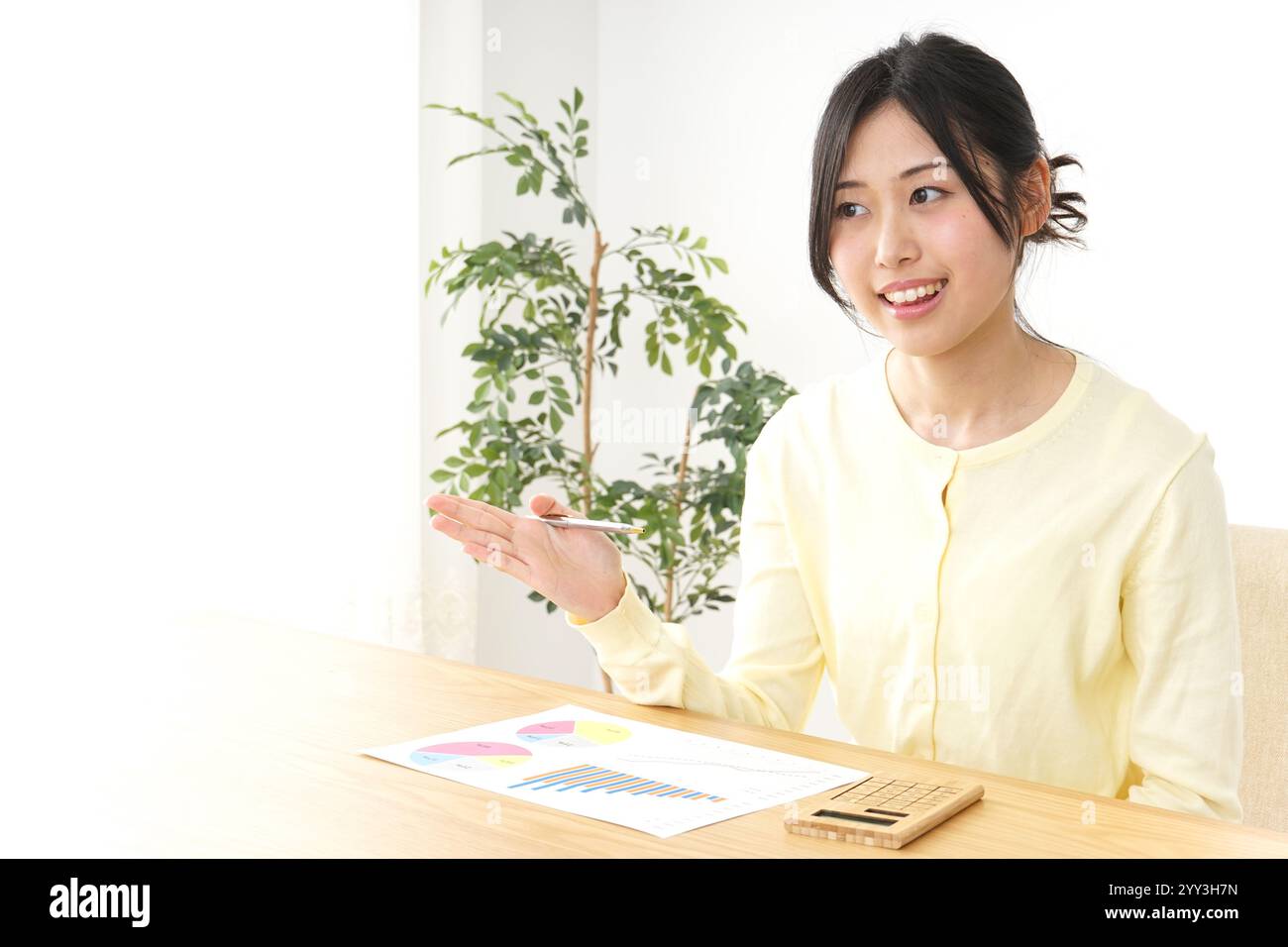 Young woman at work Stock Photo - Alamy