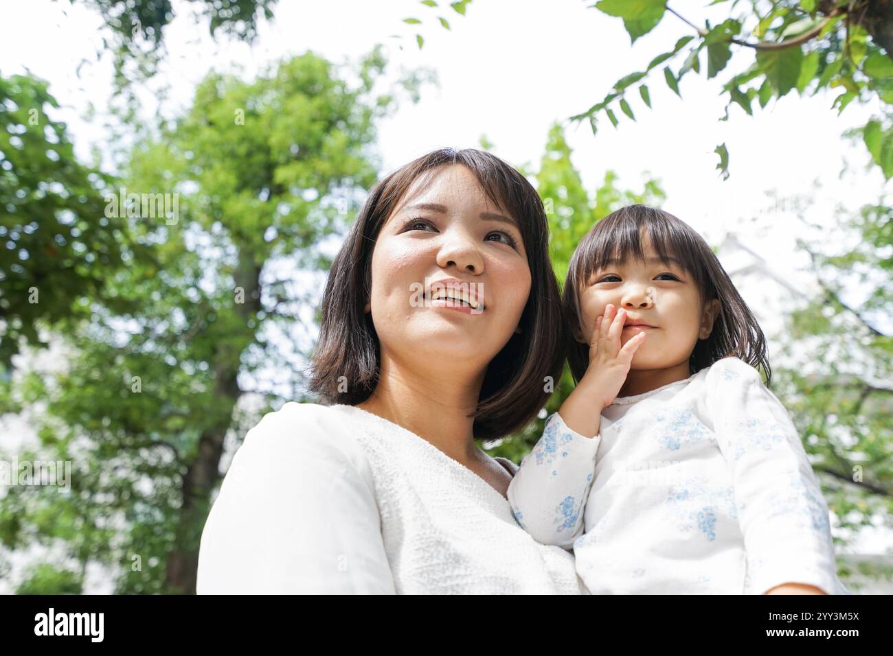 mother-holding-child-stock-photo-alamy