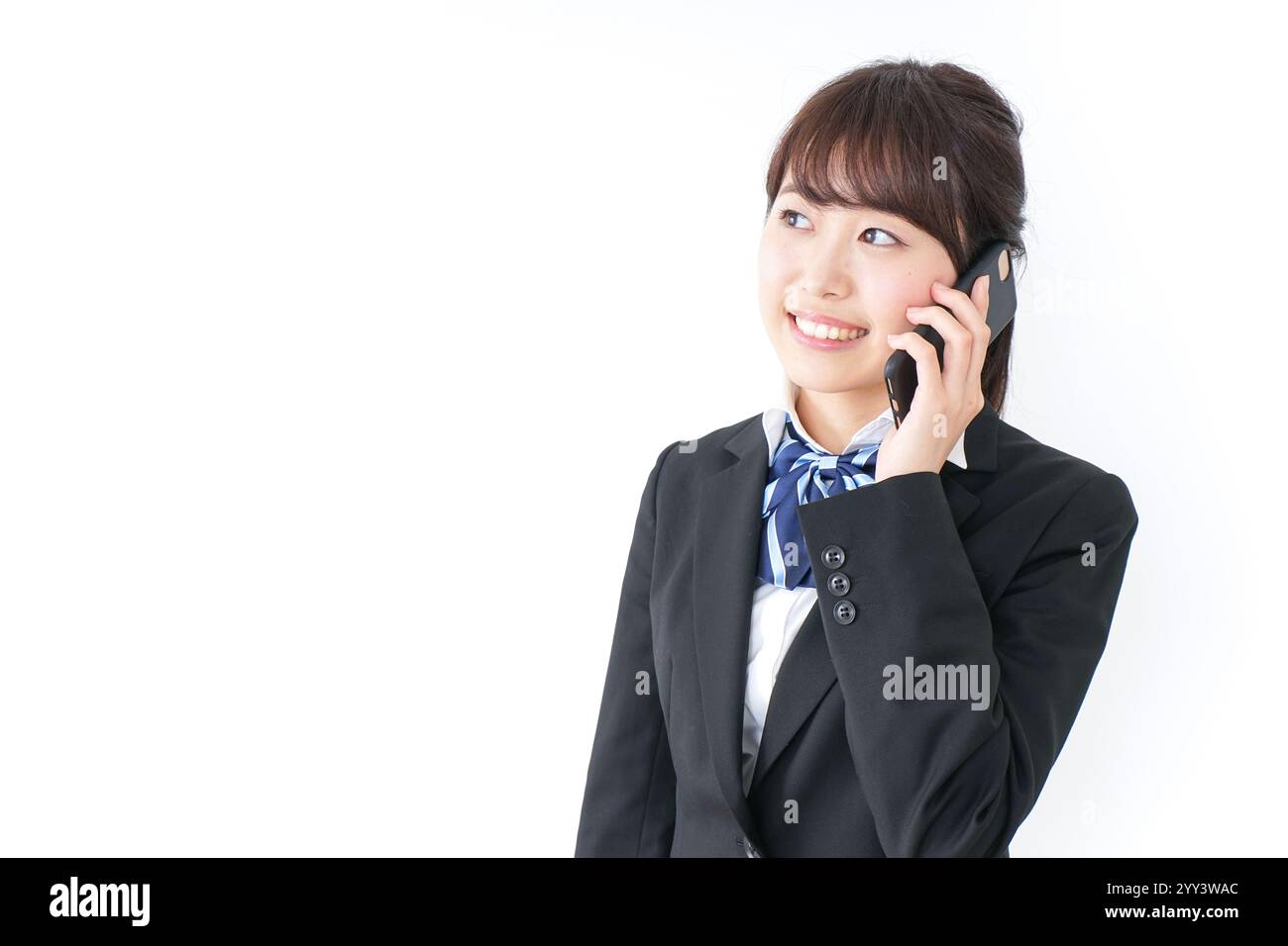 High school girl using a smartphone Stock Photo