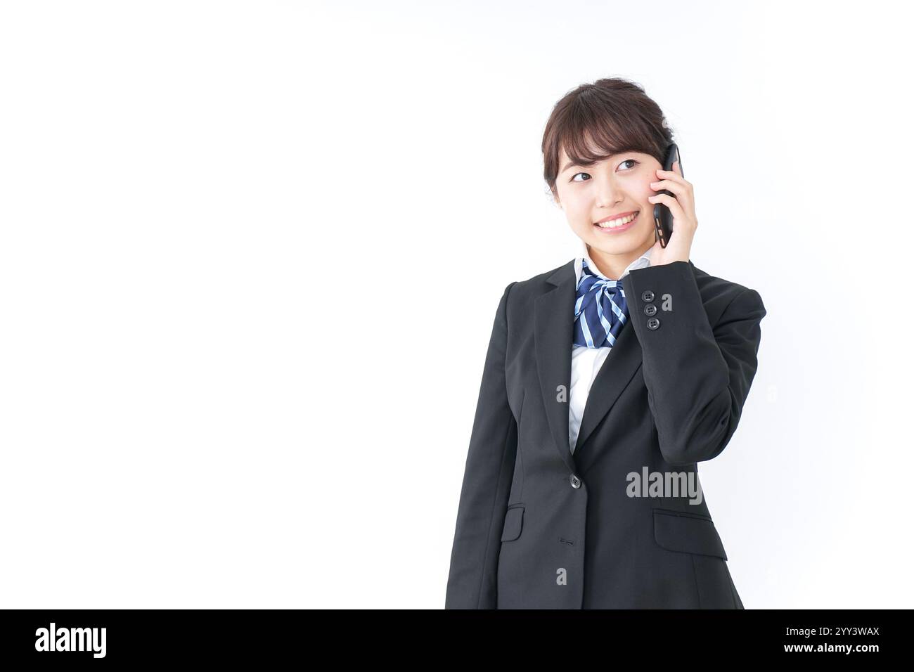 High school girl using a smartphone Stock Photo