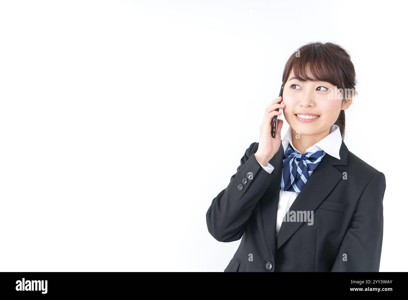 High school girl using a smartphone Stock Photo