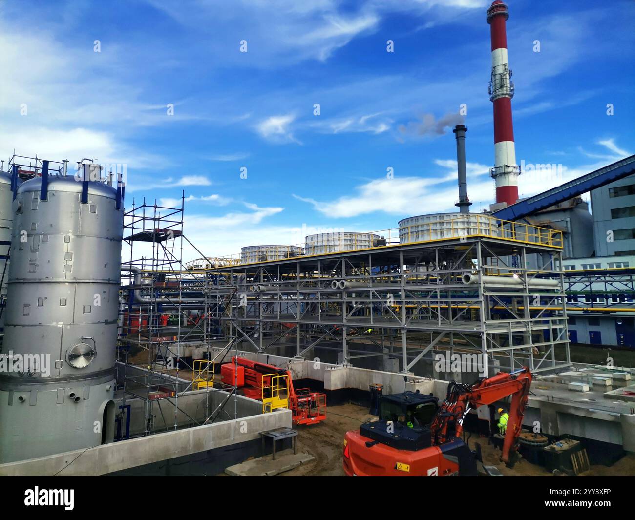 Steel structure is under construction on the construction site against ...
