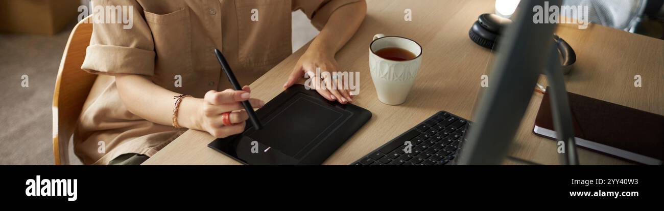 Graphic Designer Working On Tablet Stock Photo