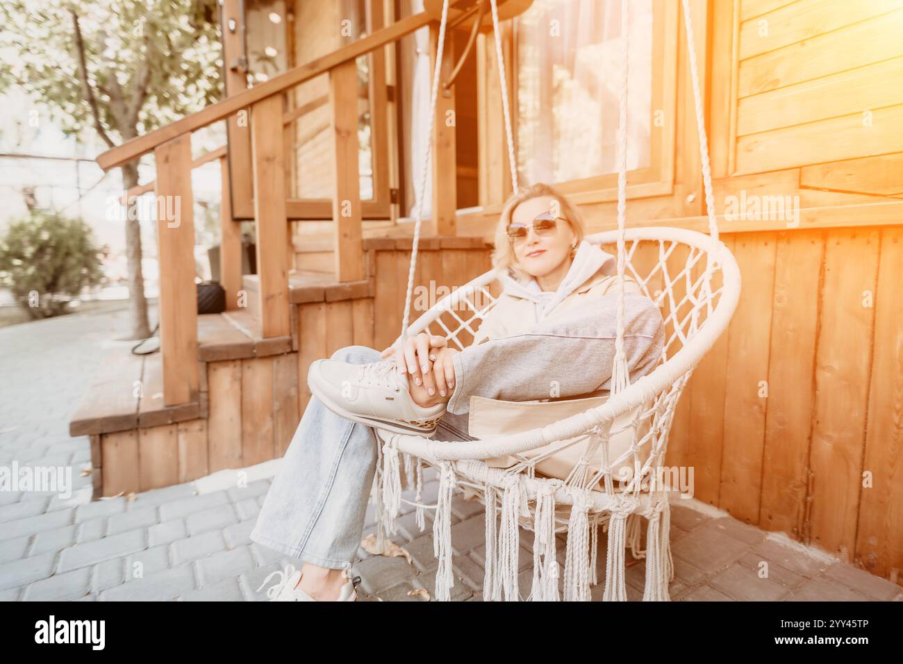 Jacket hanging in chair hi-res stock photography and images - Alamy