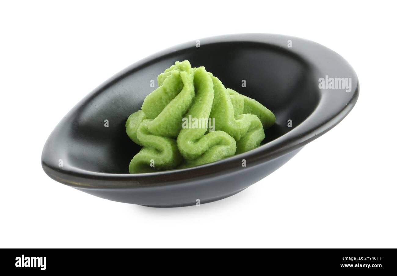 Hot wasabi paste in gravy boat isolated on white Stock Photo