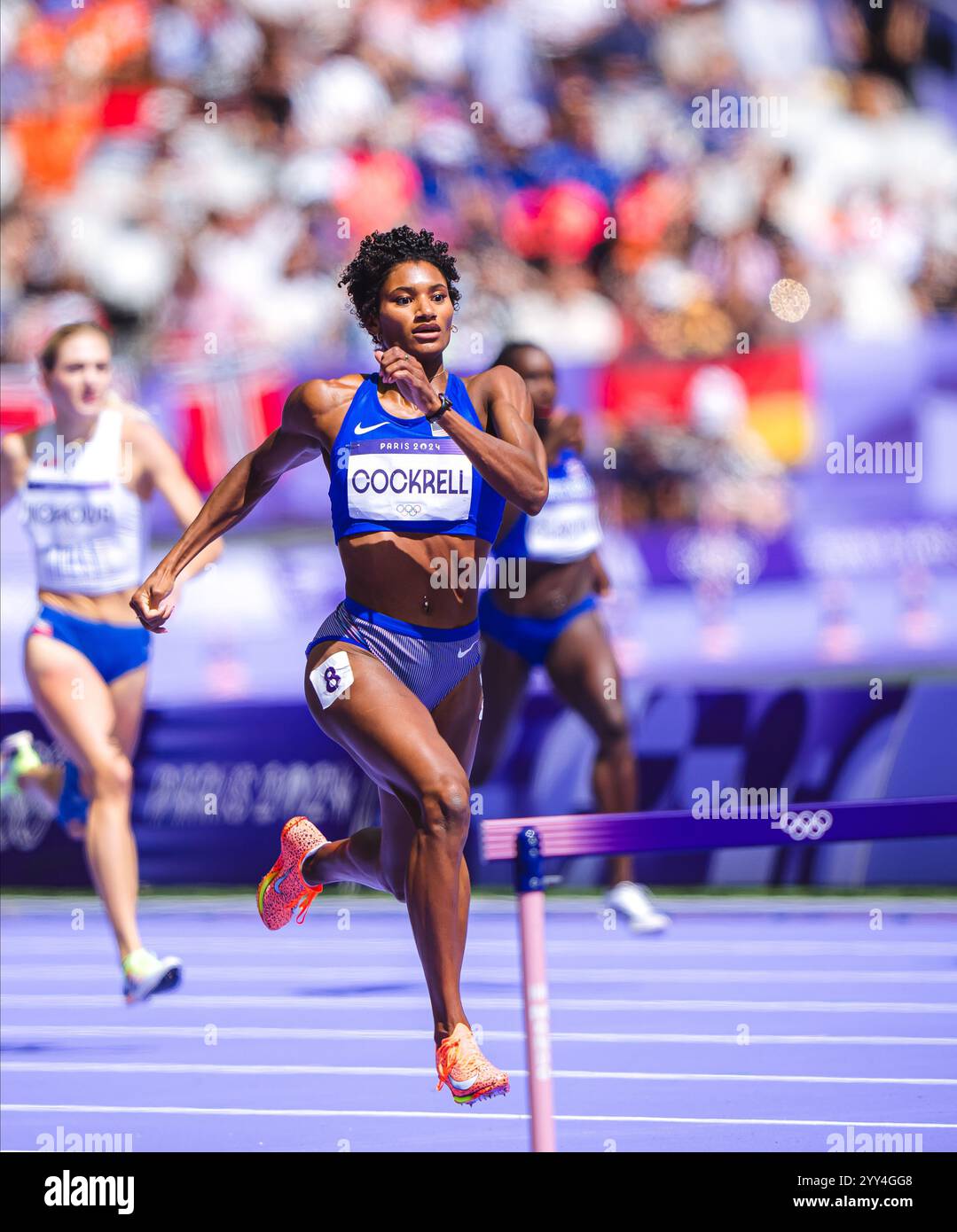 Anna Cockrell participating in the 400 meters hurdles at the Paris 2024 ...