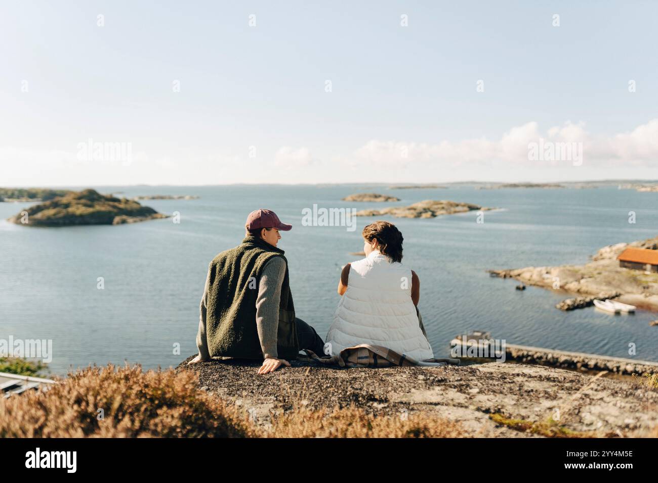 Two women sitting hill hi-res stock photography and images - Alamy