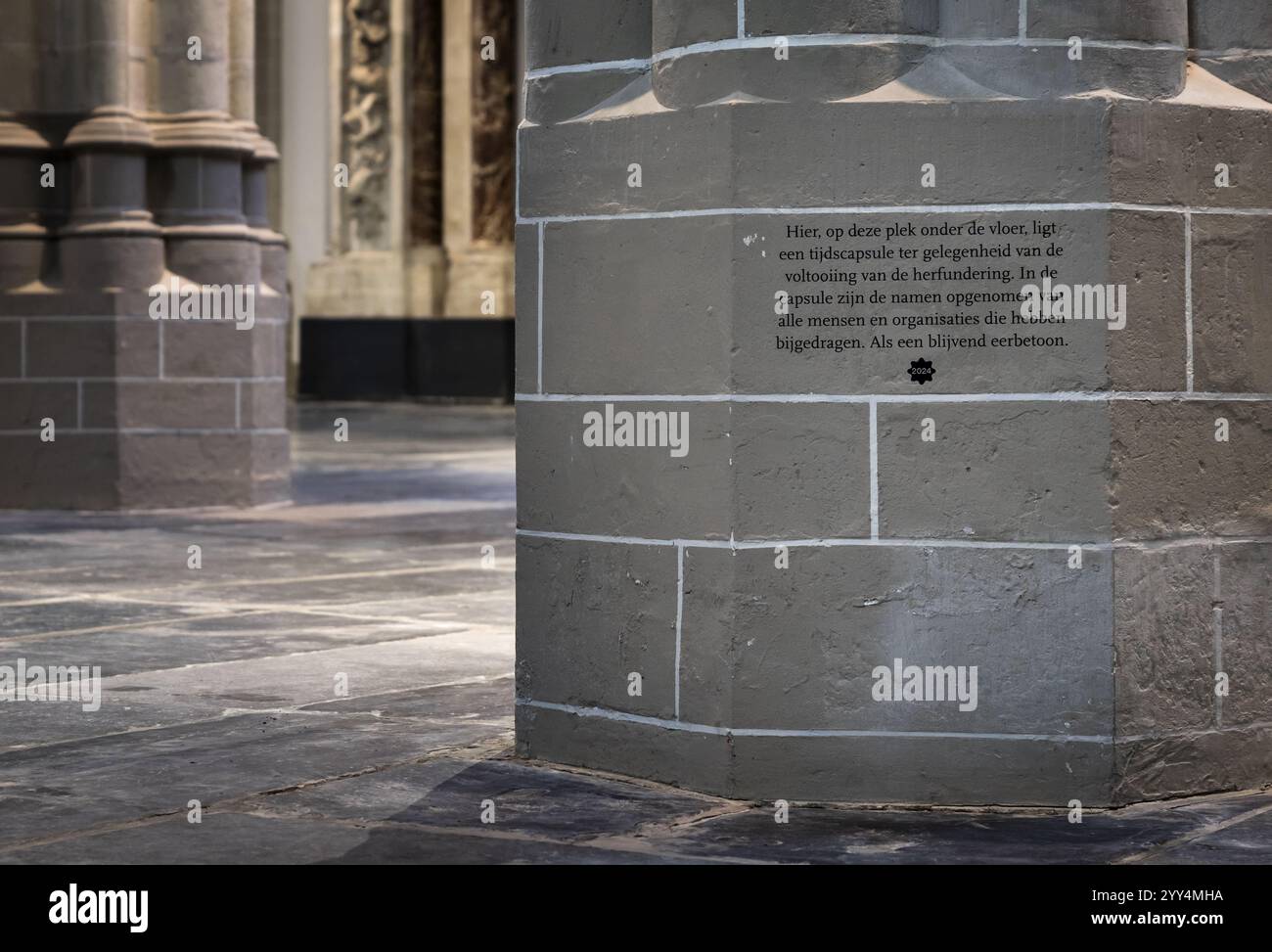 AMSTERDAM - A column in the New Church. Under this column lies a time ...