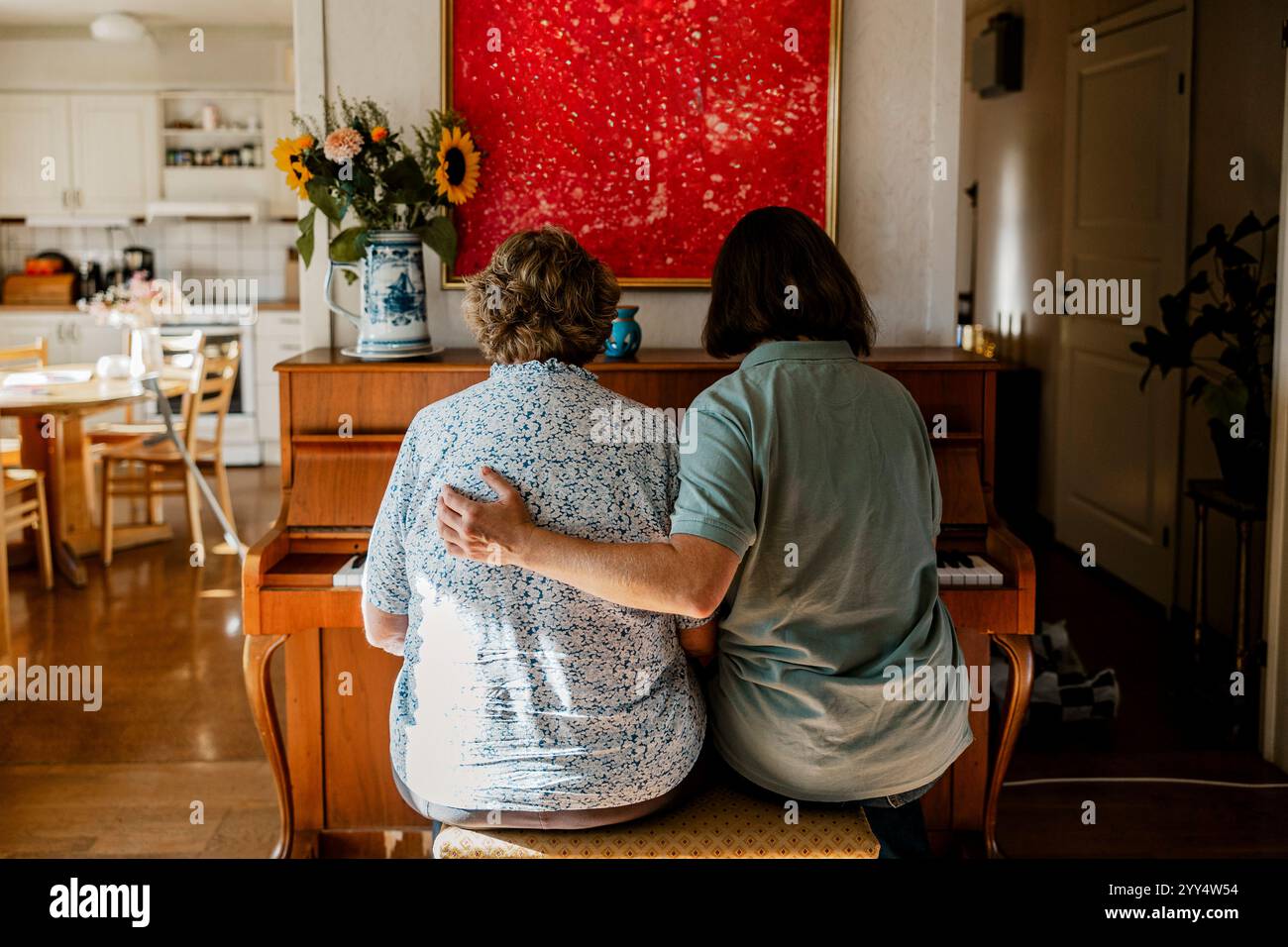 Rear view mature woman playing hi-res stock photography and images - Alamy