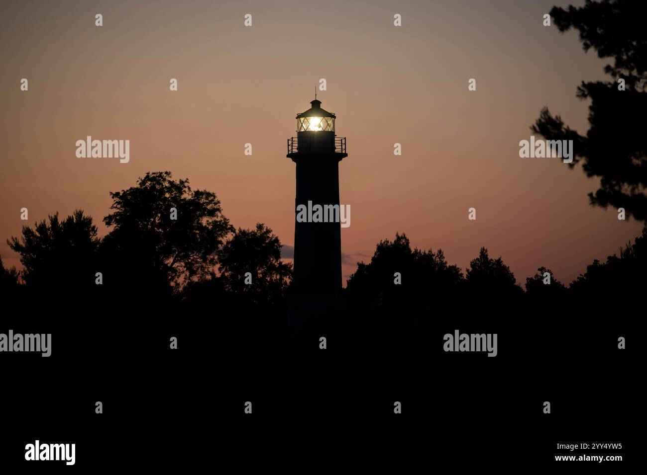 Silhouette Of Shining Lighthouse On Possidi Cape Beach On Kassandra silhouette-of-shining-lighthouse-on-possidi-cape-beach-on-kassandra