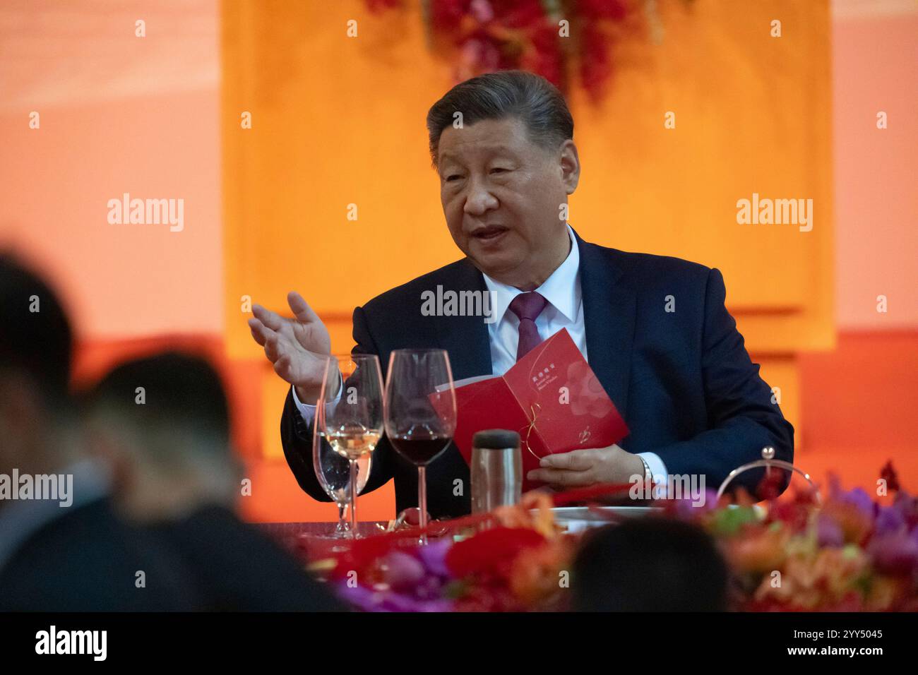 Chinese President Xi Jinping gestures as he talks to leaders during a ...