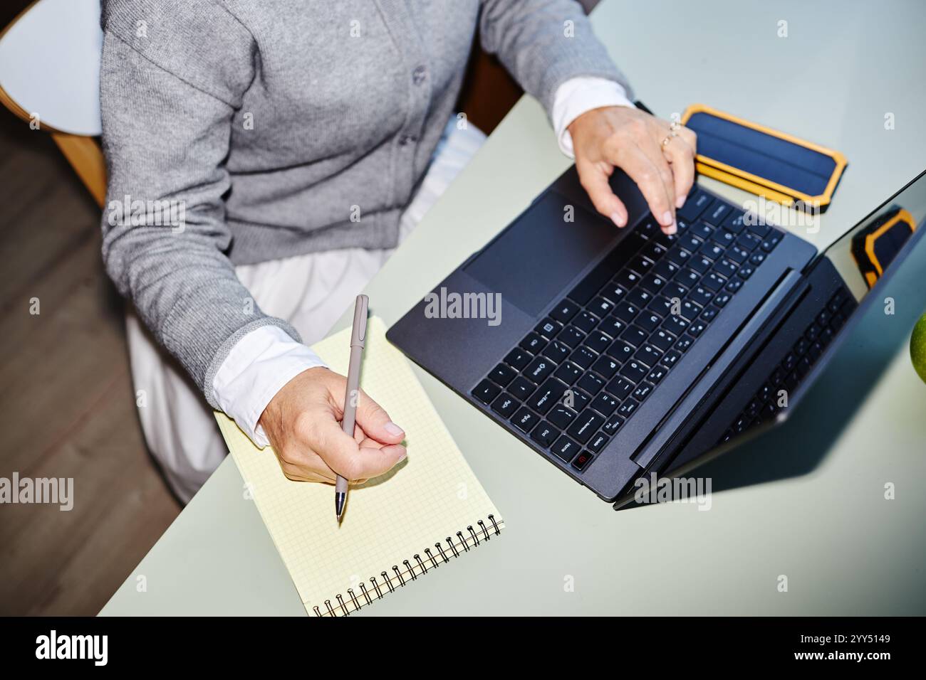 Cropped woman typing laptop taking hi-res stock photography and images ...