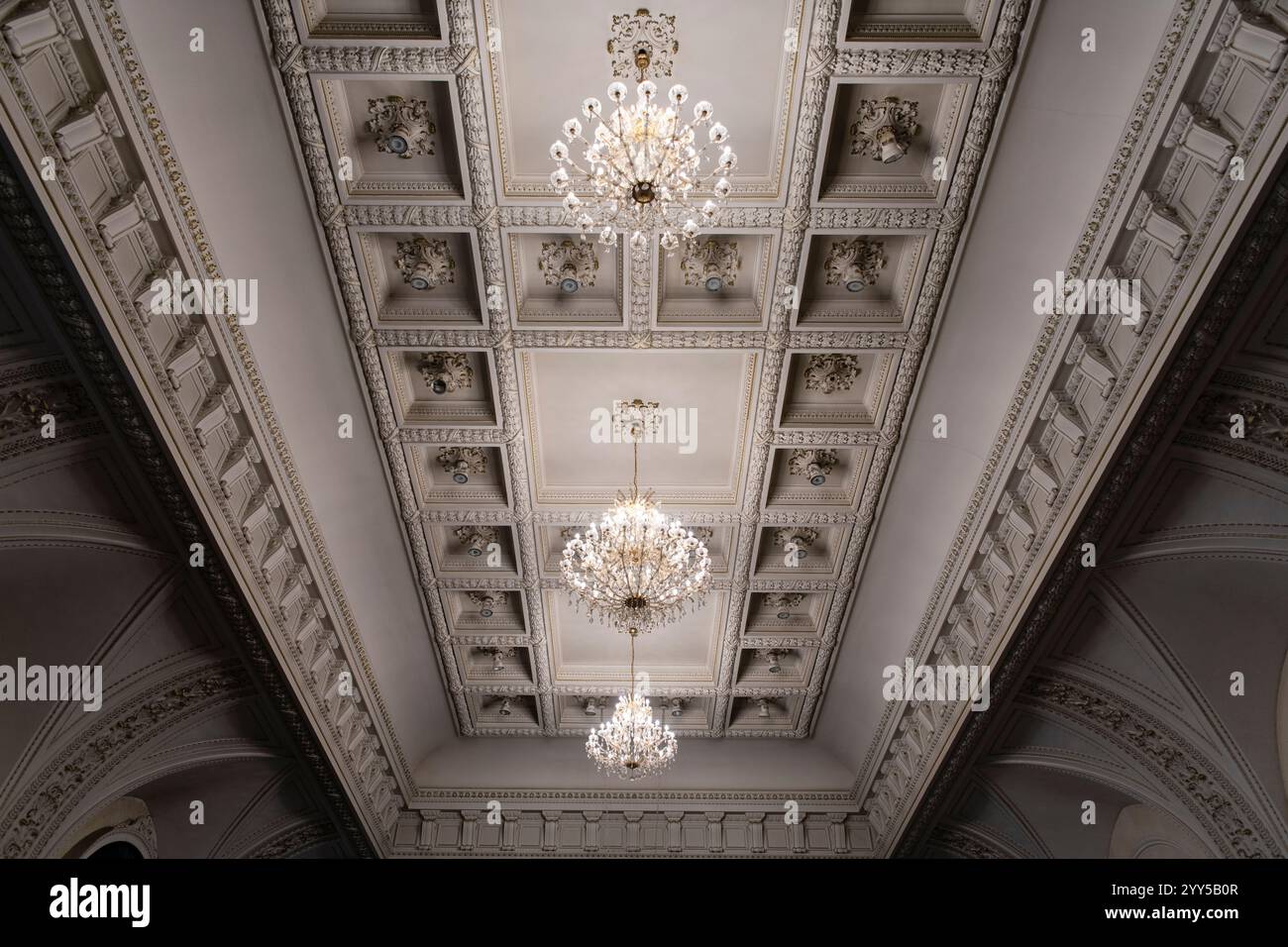 Luxury expensive chandeliers hanging under old vintage ceiling in ... - Luxurious Decorative Ceilings