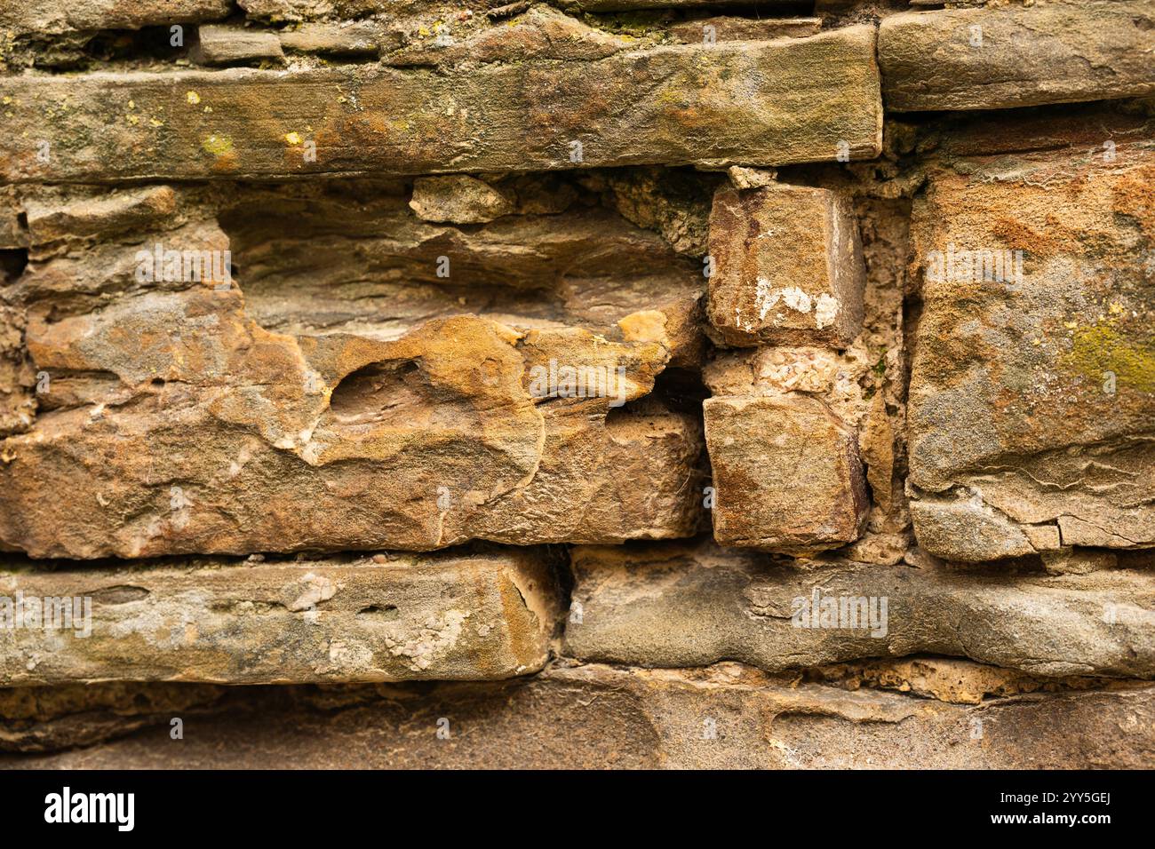Close up striped and rectangular stone wall pattern, texture. Horizontal photo. background and mapping Stock Photo