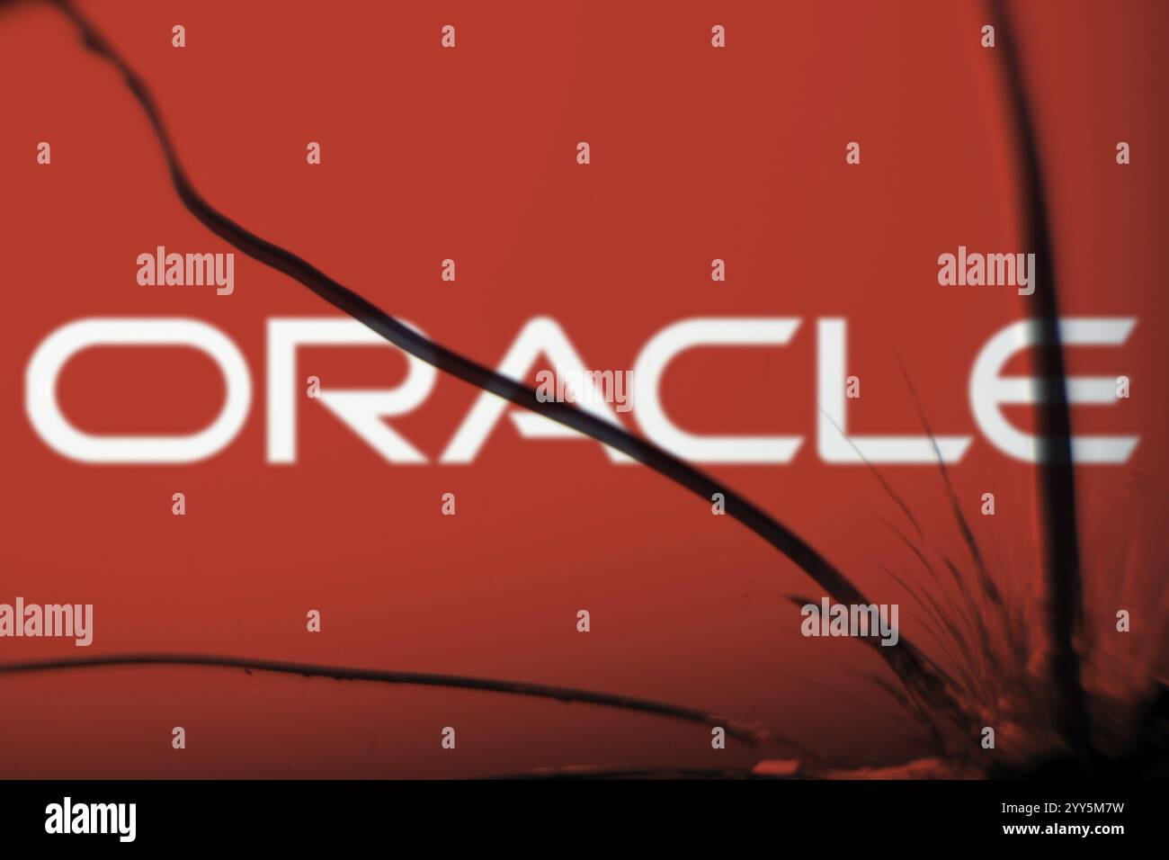 Oracle logo is visible on the broken glass. Oracle Corporation is an ...
