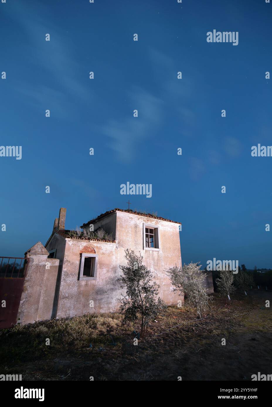 An old ruined building still standing with a night sky Stock Photo - Alamy