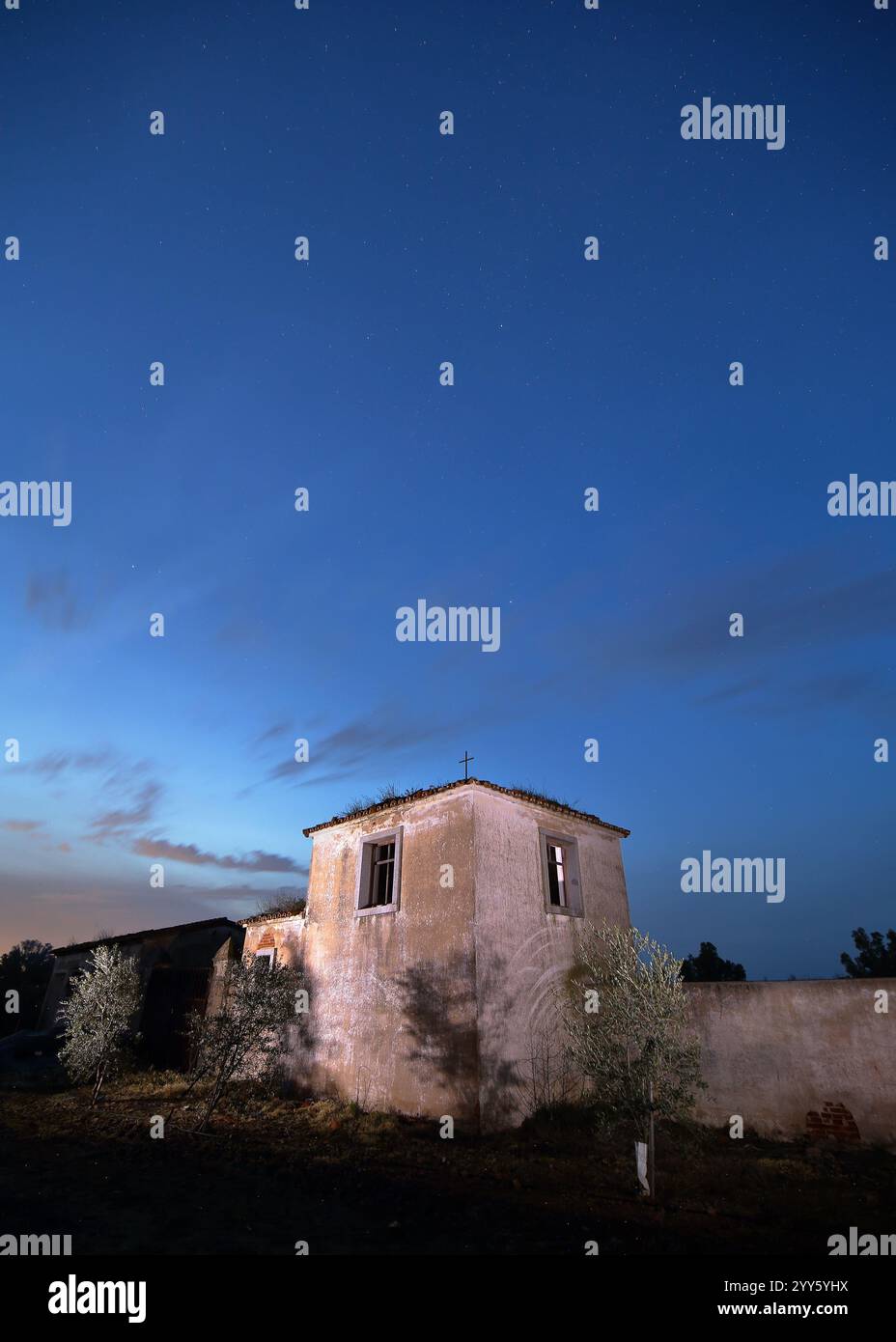 An old ruined building still standing with a night sky Stock Photo - Alamy