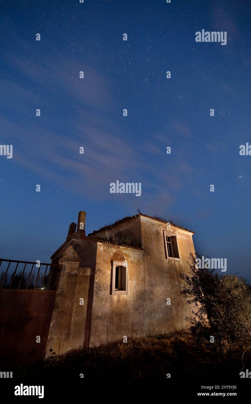 An old ruined building still standing with a night sky Stock Photo - Alamy