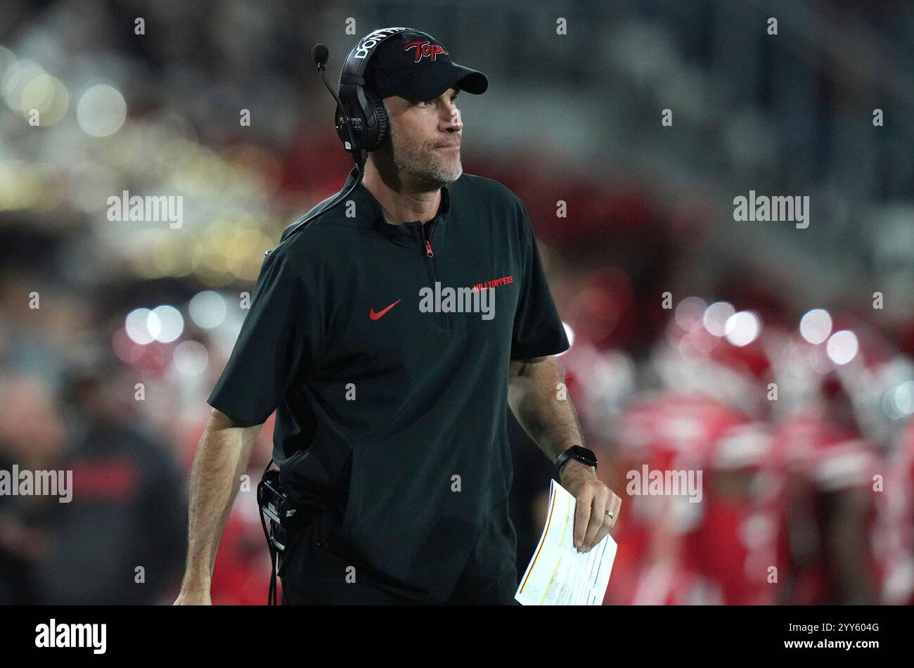 Western Kentucky head coach Tyson Helton watches during the first half