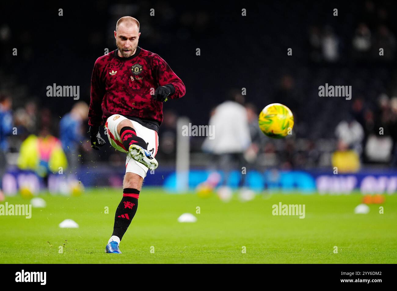 Manchester United's Christian Eriksen warms up ahead of the Carabao Cup