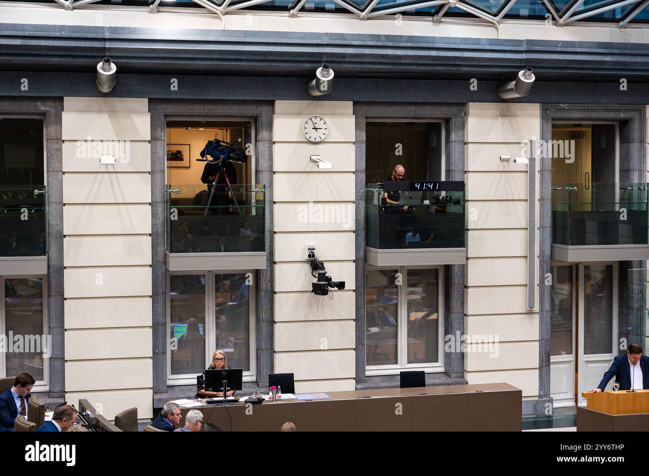 Brussels, Flemish Parliament, DEC 18, 2024 - Journalists at work in the press loges during the plenary sitting. Stock Photo