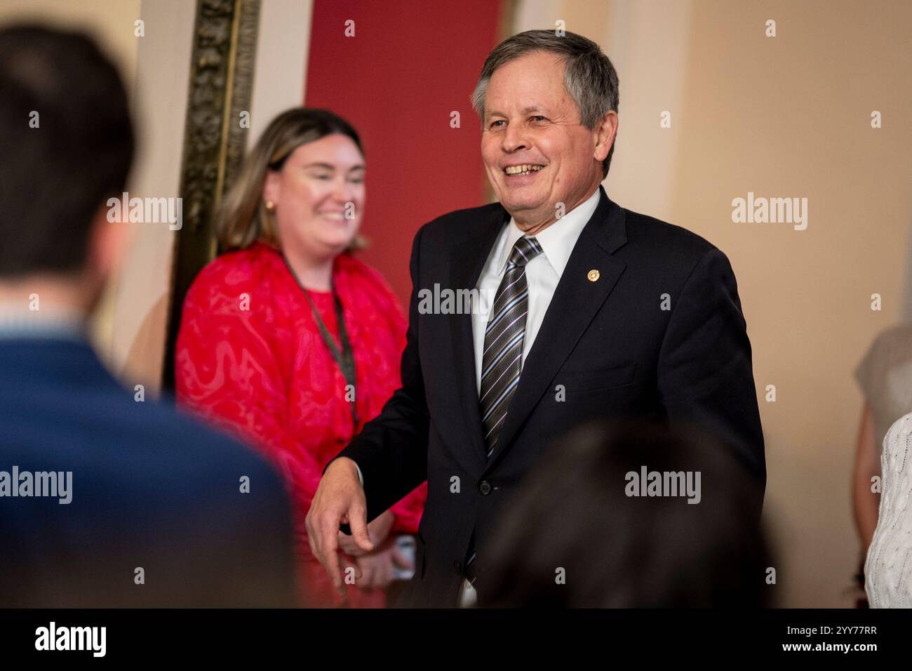 Sen. Steve Daines (RMont.) heads to the House chamber to vote on the