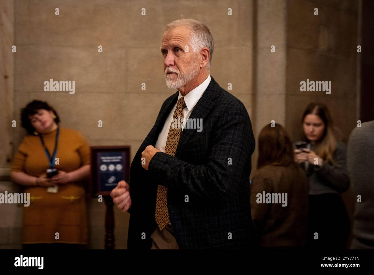 Sen. Thom Tillis (RN.C.) heads toward the House side of the Capitol