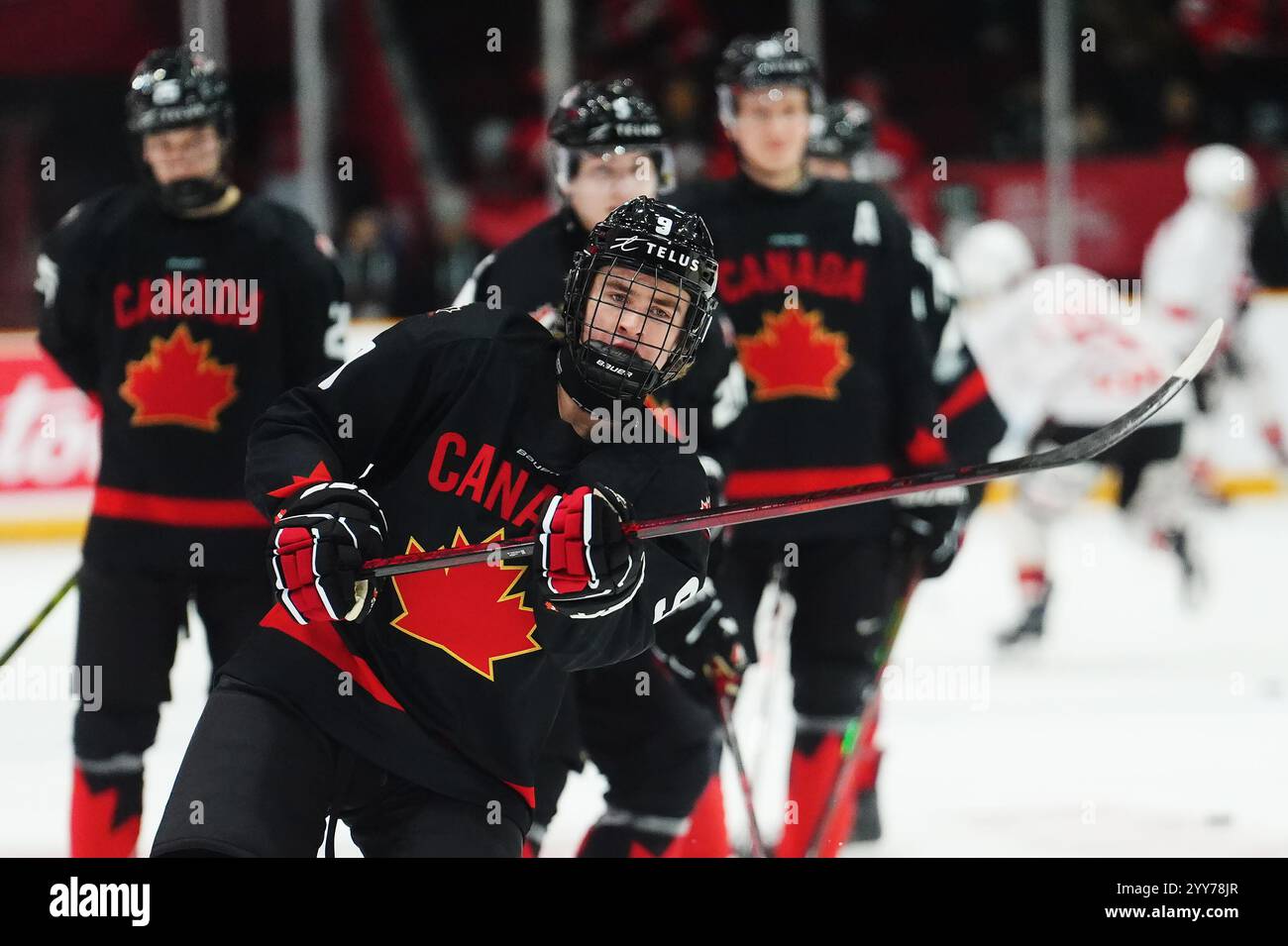 Canada's Gavin McKenna (9) looks on during warmup prior to IIHF World